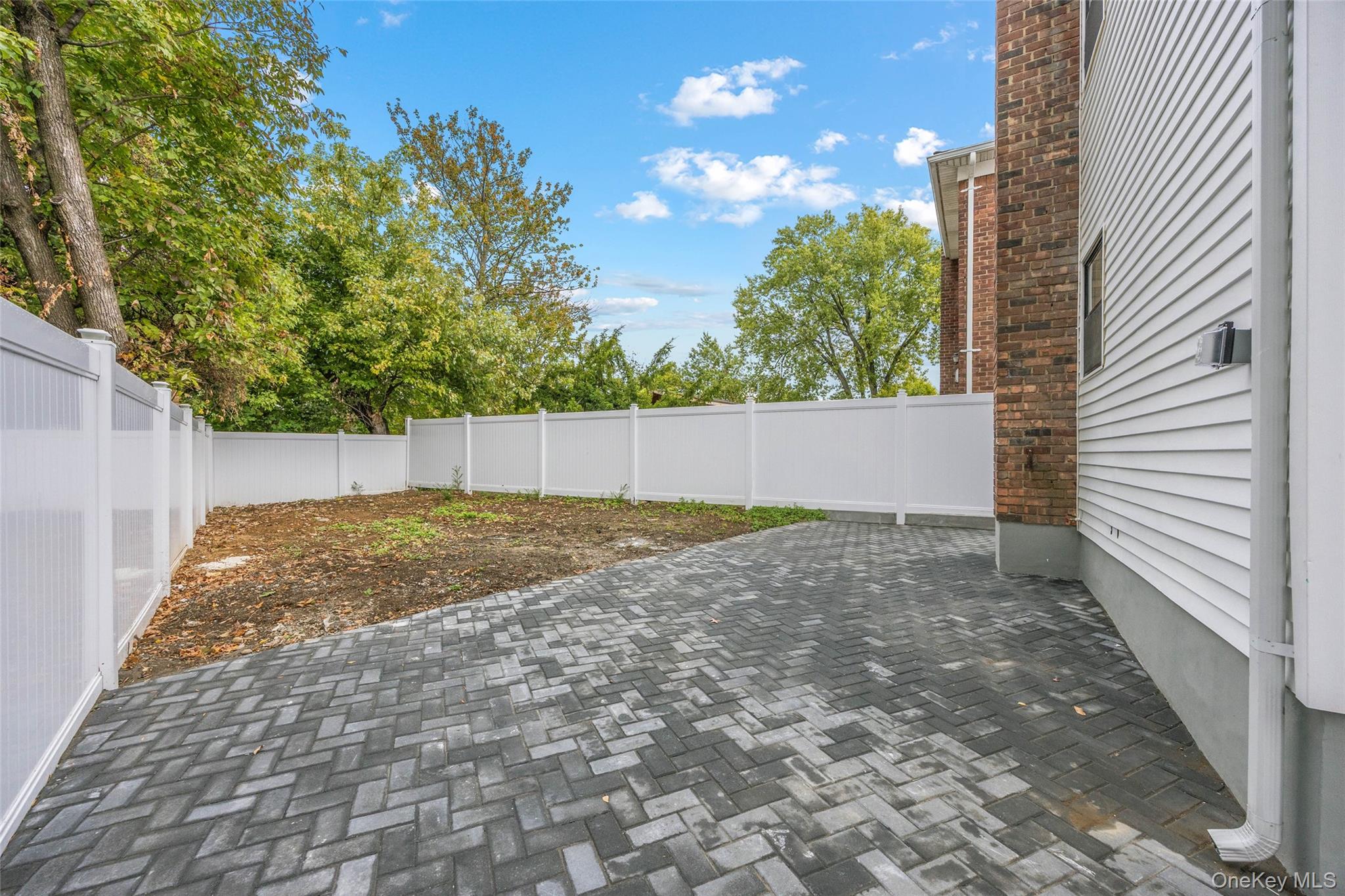 157-03 Locke Avenue Queens, NY 11357 - Photo 23 of 24 a backyard of a house