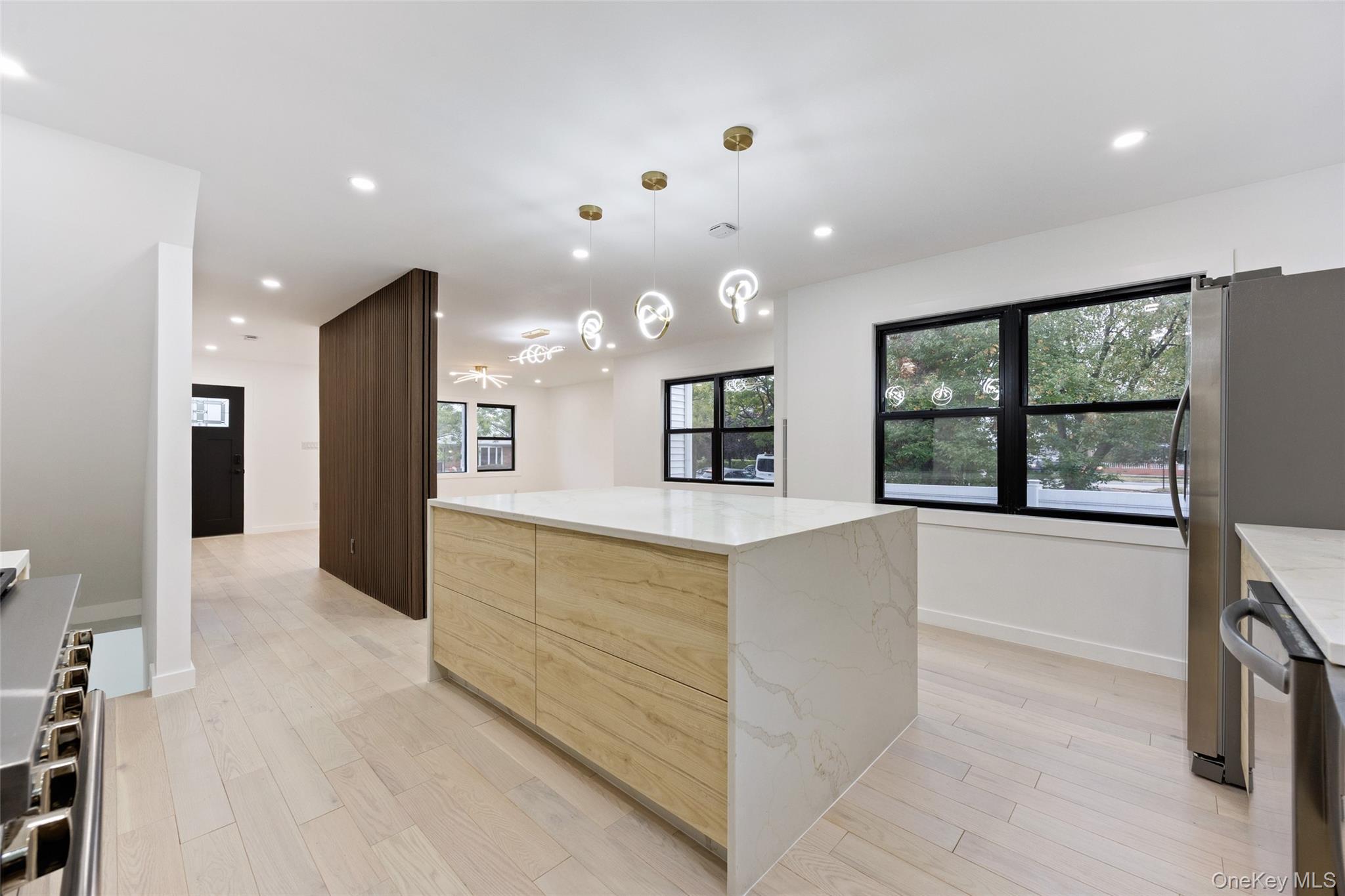 157-03 Locke Avenue Queens, NY 11357 - Photo 7 of 24 a large bathroom with a large tub and shower
