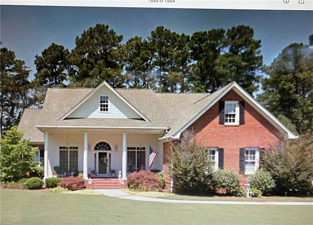 29 Club View Drive Southeast Rome, GA 30161 - Photo 1 of 1 a front view of a house with yard