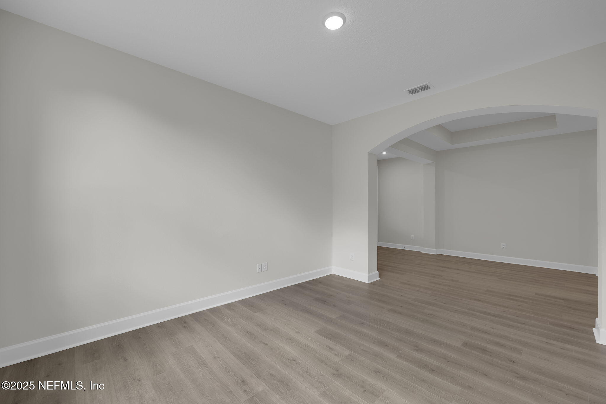 80 Oak Cluster Lane St. Augustine, FL 32092 - Photo 13 of 53 a view of an empty room with wooden floor and closet