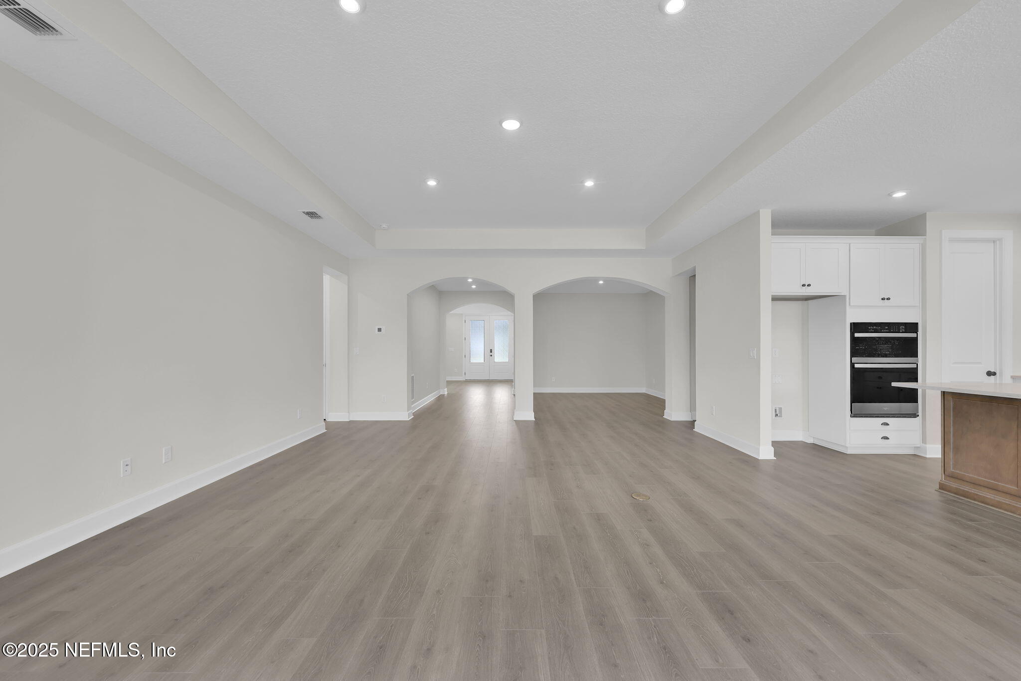 80 Oak Cluster Lane St. Augustine, FL 32092 - Photo 15 of 53 a view of empty room with wooden floor and window