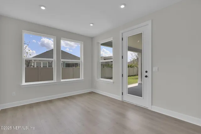 an empty room with windows