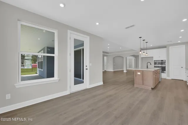 an empty room with windows