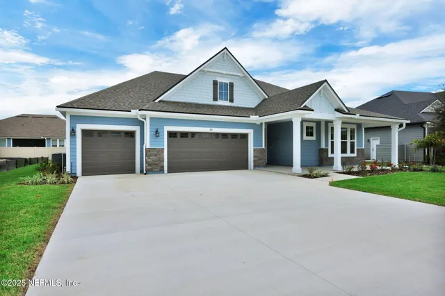 a view of an empty room with a windows