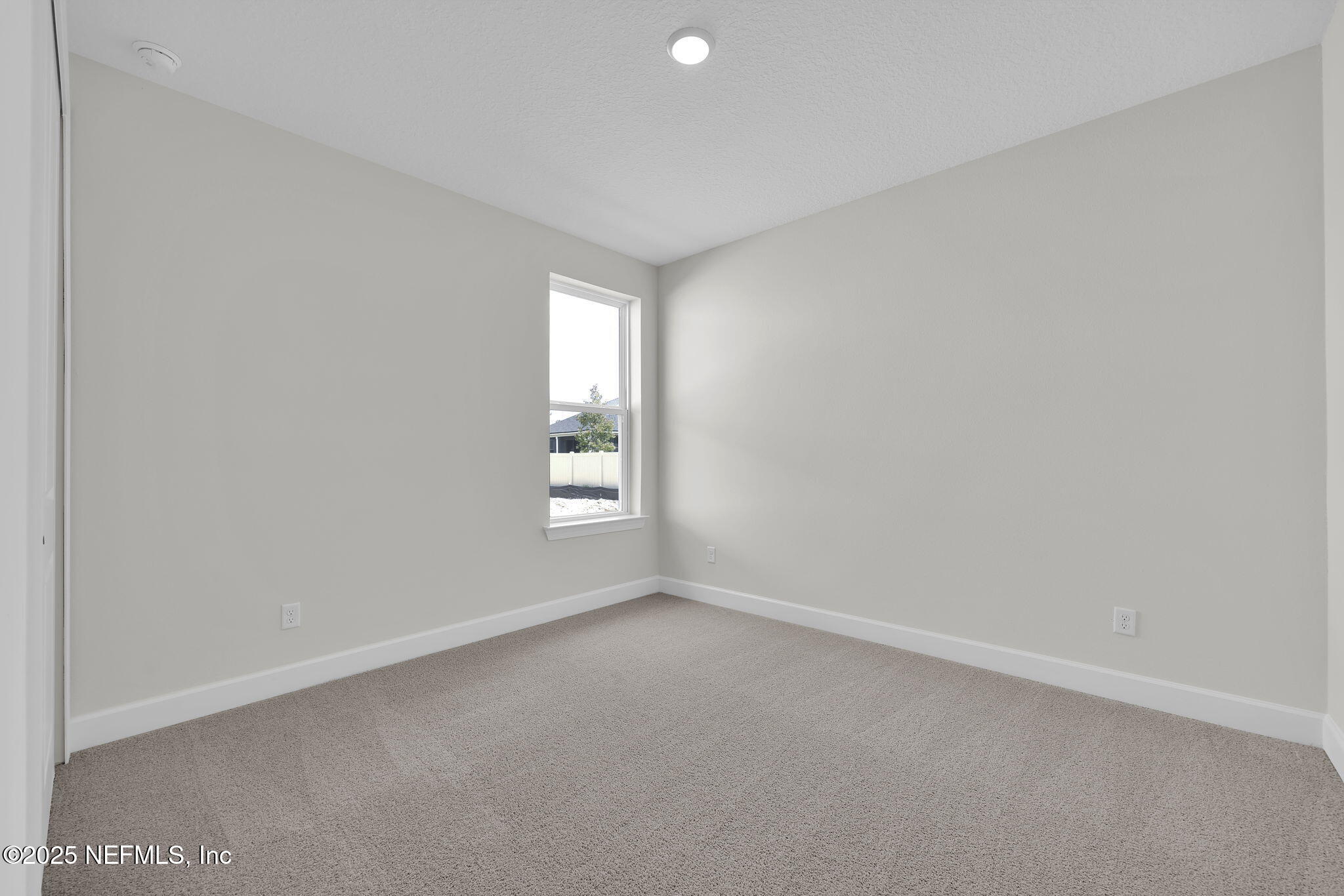 80 Oak Cluster Lane St. Augustine, FL 32092 - Photo 45 of 53 an empty room with windows