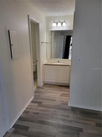 a view of hallway with washer and dryer