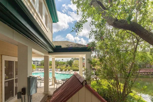 a view of balcony with two chairs