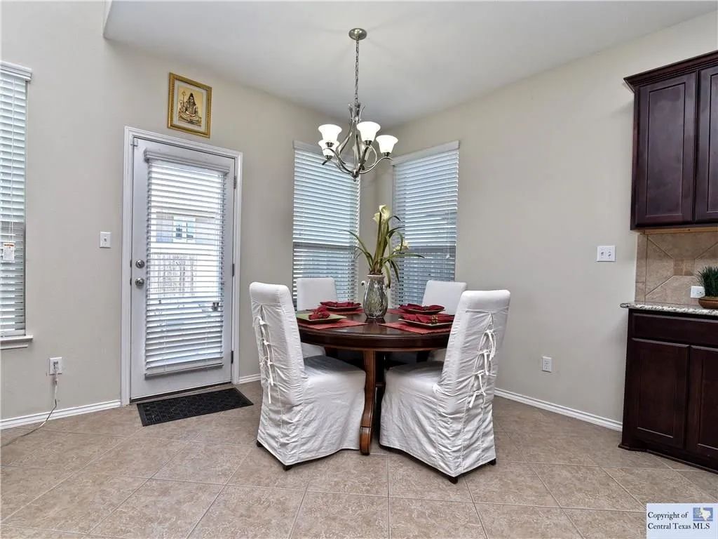 3029 Jacob Lane San Marcos, TX 78666 - Photo 11 of 24 a dining room with furniture and window