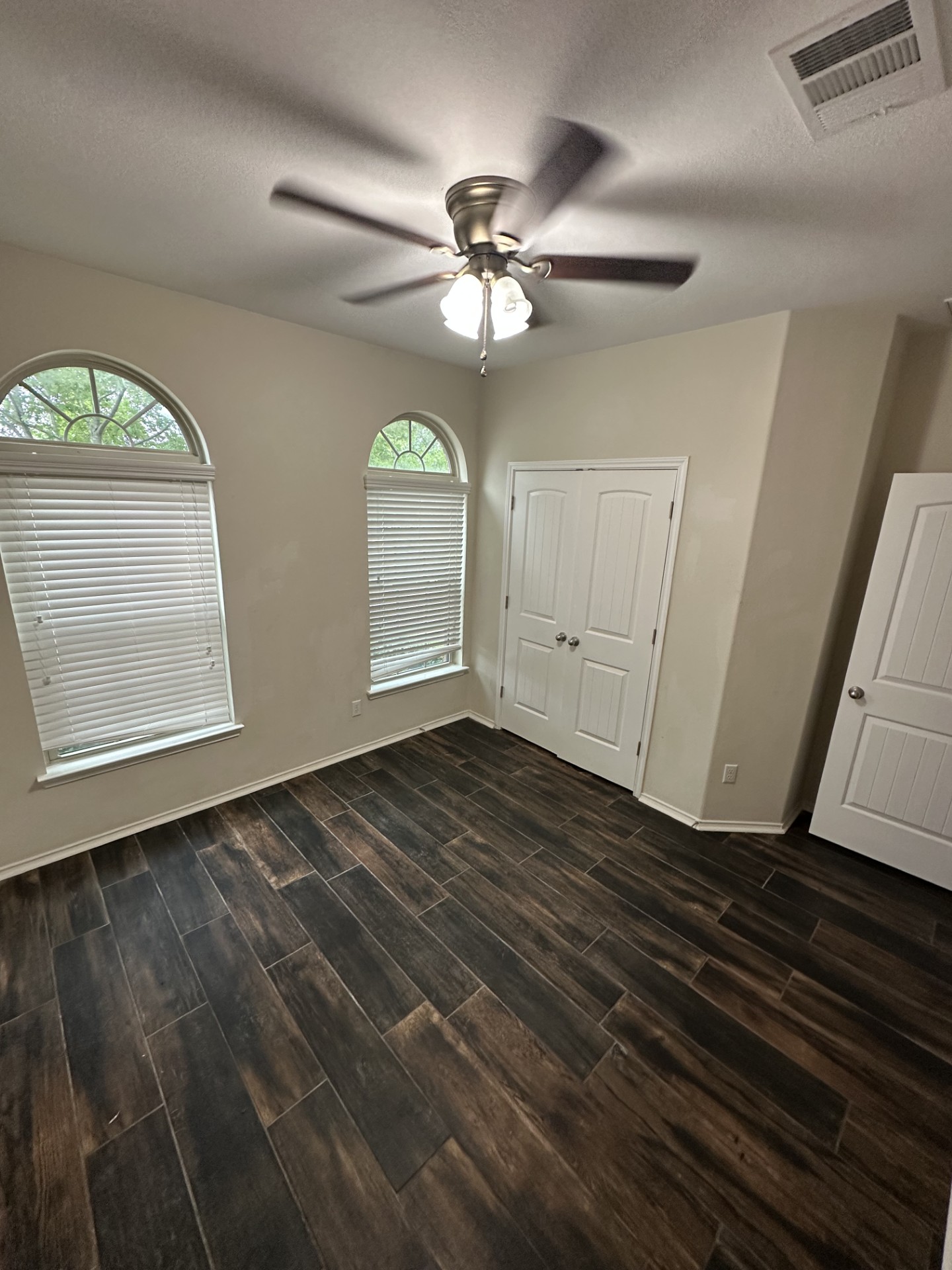 3029 Jacob Lane San Marcos, TX 78666 - Photo 23 of 24 en empty room with window and wooden floor