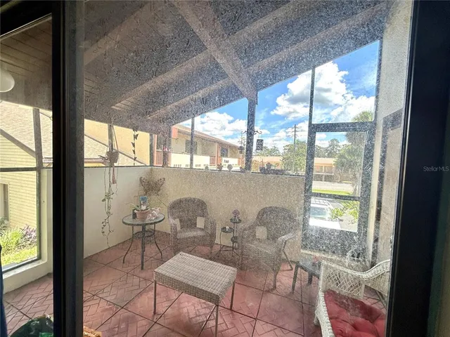 a view of a cars parked in front of a building