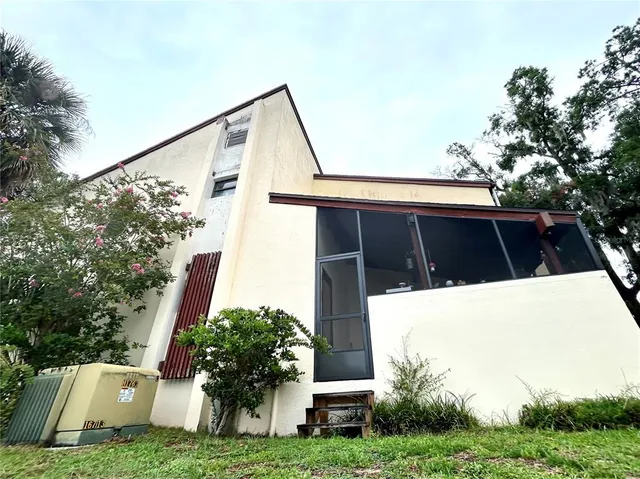 a view of a room with a large window