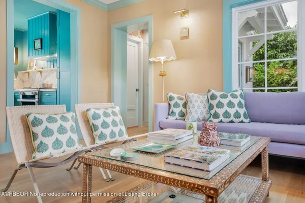 a living room with furniture and window