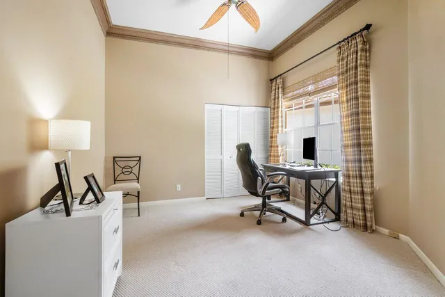 a work room with furniture and a window