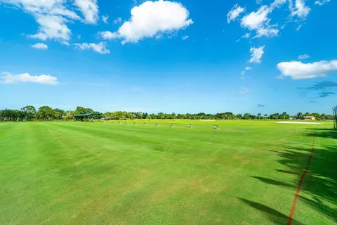 a view of an ocean and a yard