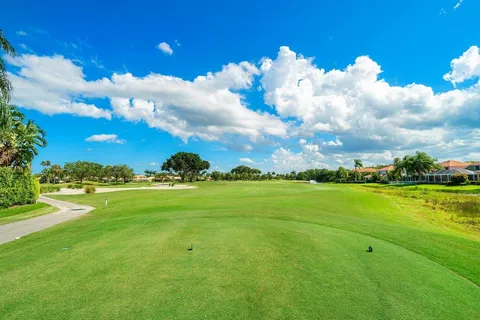 a view of an ocean and a houses