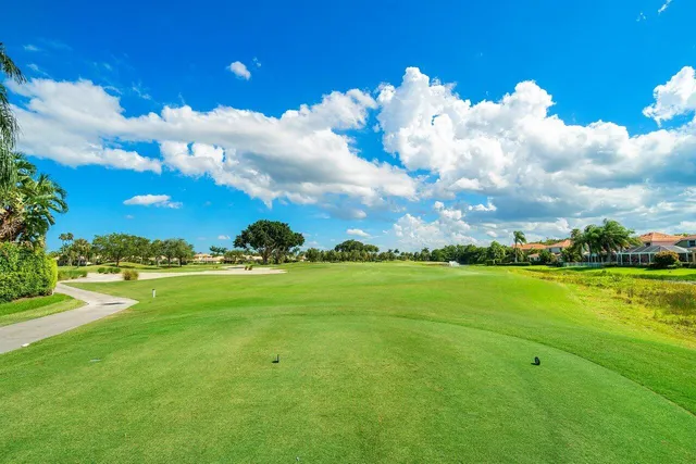 a view of an ocean and a houses