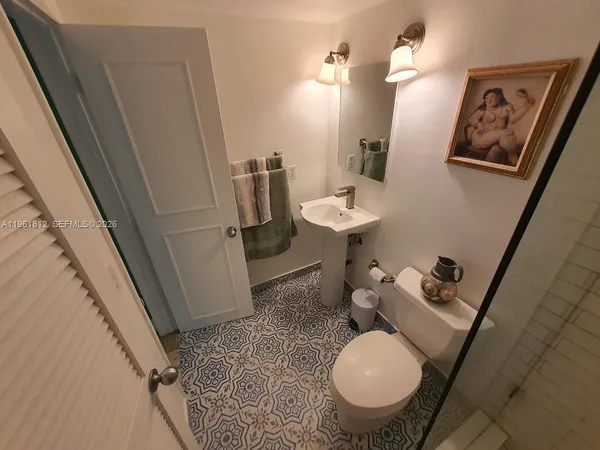 a view of a door and a window