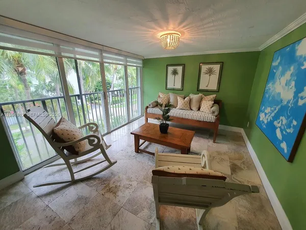 a living room with furniture and a table