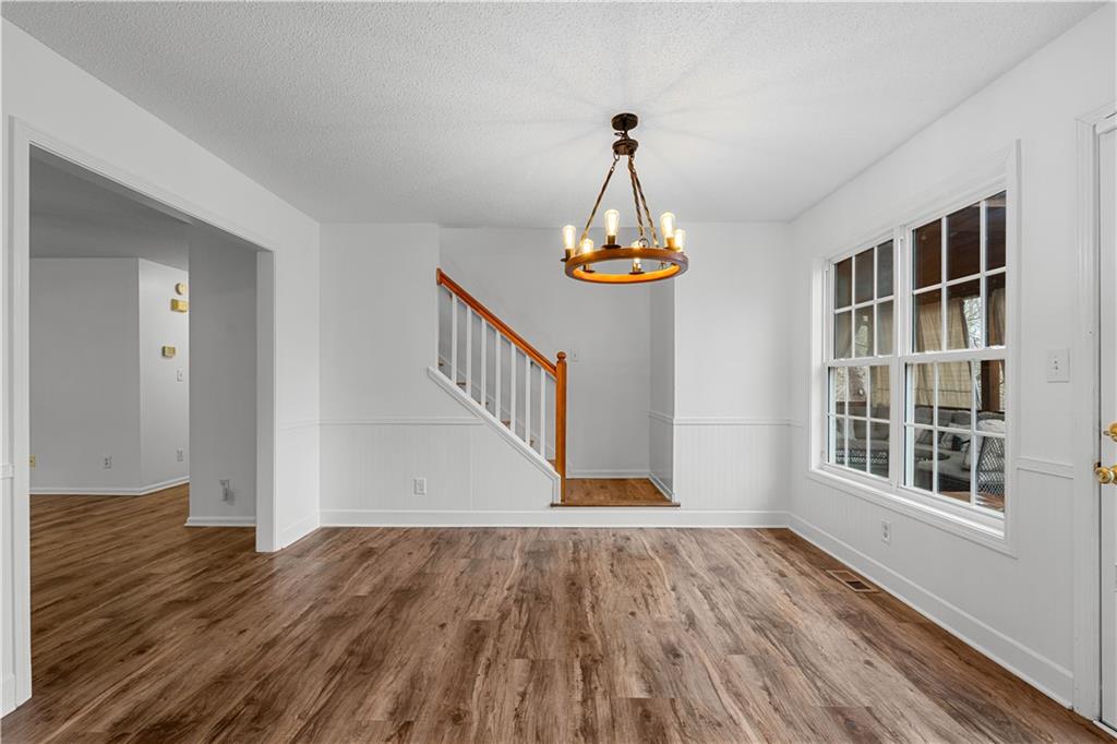3048 Turner Church Road McDonough, GA 30252 - Photo 15 of 57 a view of empty room with a window and wooden floor
