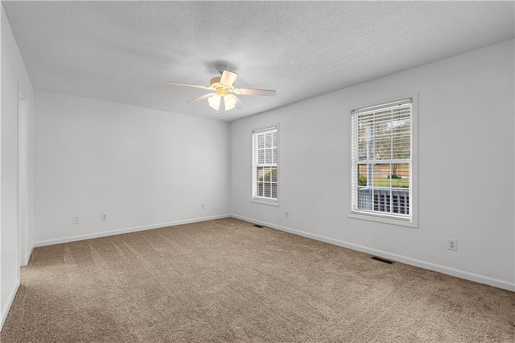 3048 Turner Church Road McDonough, GA 30252 - Photo 18 of 57 an empty room with a window