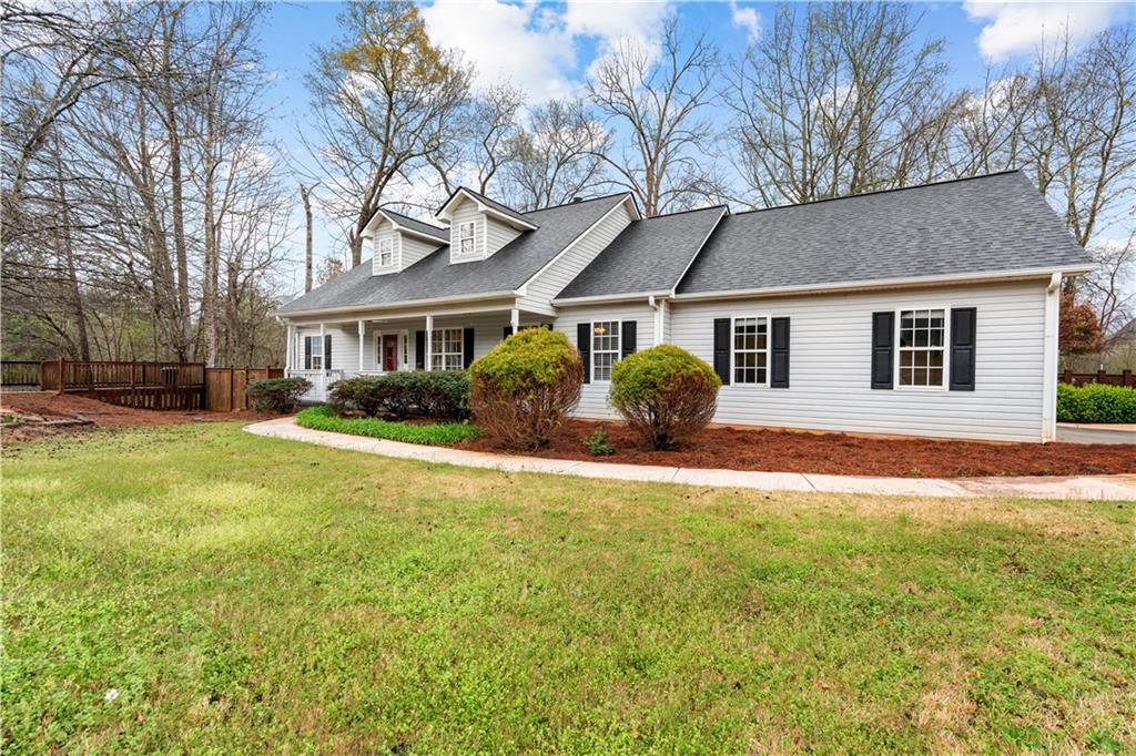 3048 Turner Church Road McDonough, GA 30252 - Photo 2 of 57 a front view of house with yard and trees around