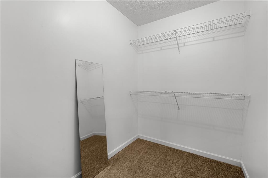 3048 Turner Church Road McDonough, GA 30252 - Photo 24 of 57 a view of a room with racks on the wall