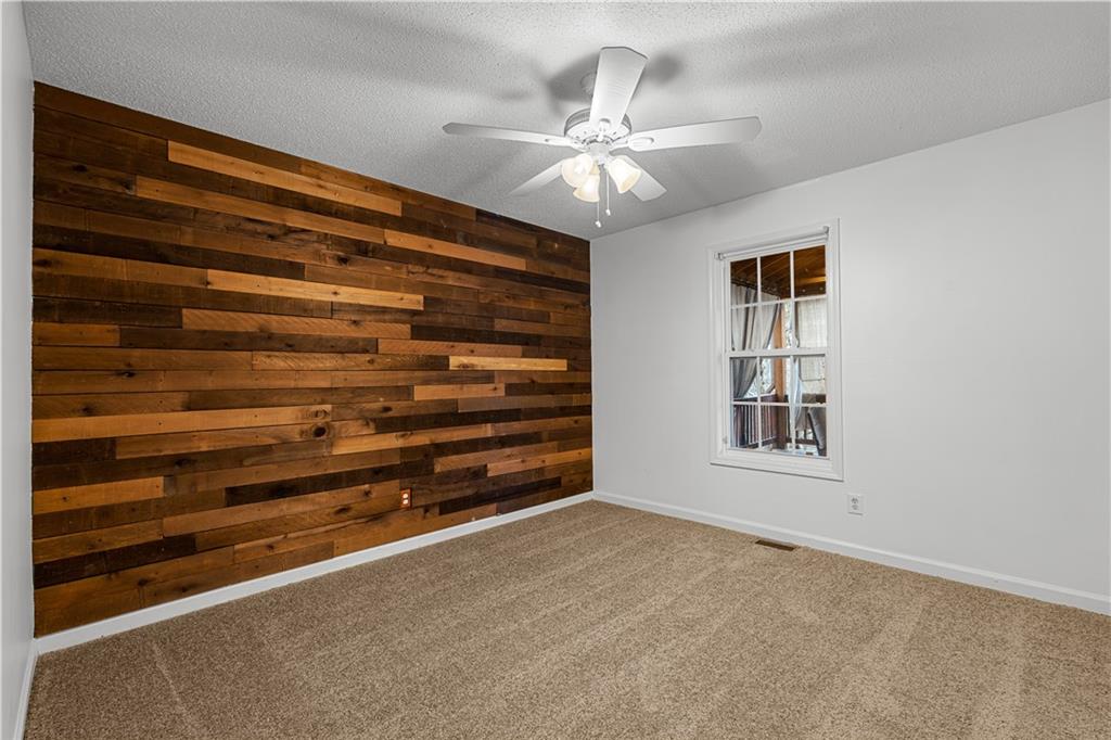 3048 Turner Church Road McDonough, GA 30252 - Photo 25 of 57 a view of room with a ceiling fan