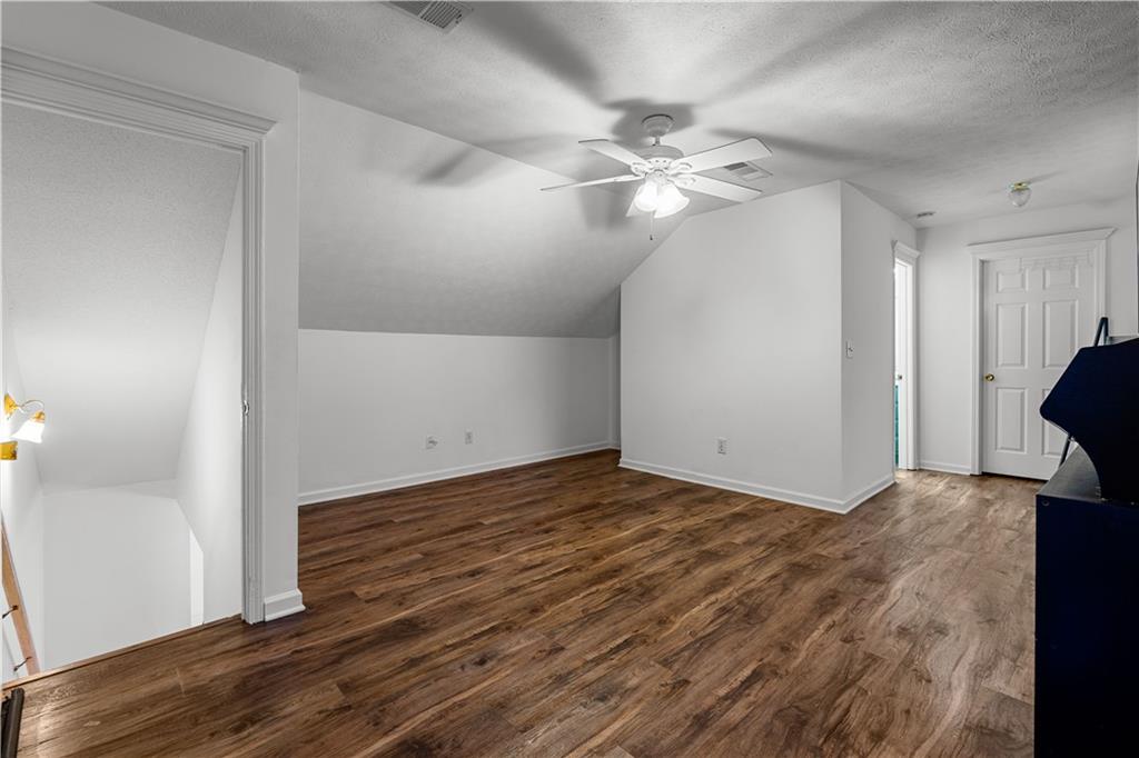 3048 Turner Church Road McDonough, GA 30252 - Photo 31 of 57 a view of an empty room with wooden floor