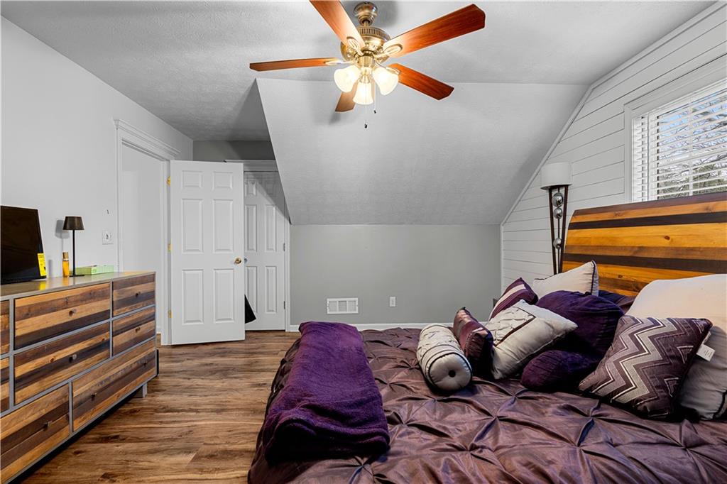 3048 Turner Church Road McDonough, GA 30252 - Photo 33 of 57 a bedroom with furniture and a window