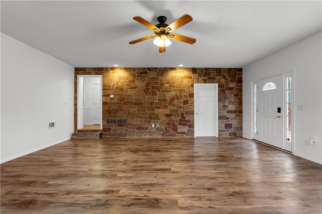 3048 Turner Church Road McDonough, GA 30252 - Photo 41 of 57 wooden floor in an empty room with a window