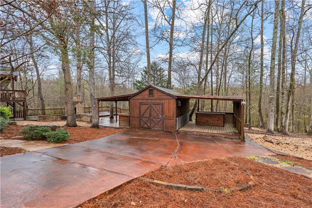3048 Turner Church Road McDonough, GA 30252 - Photo 47 of 57 a backyard of a house with table and chairs