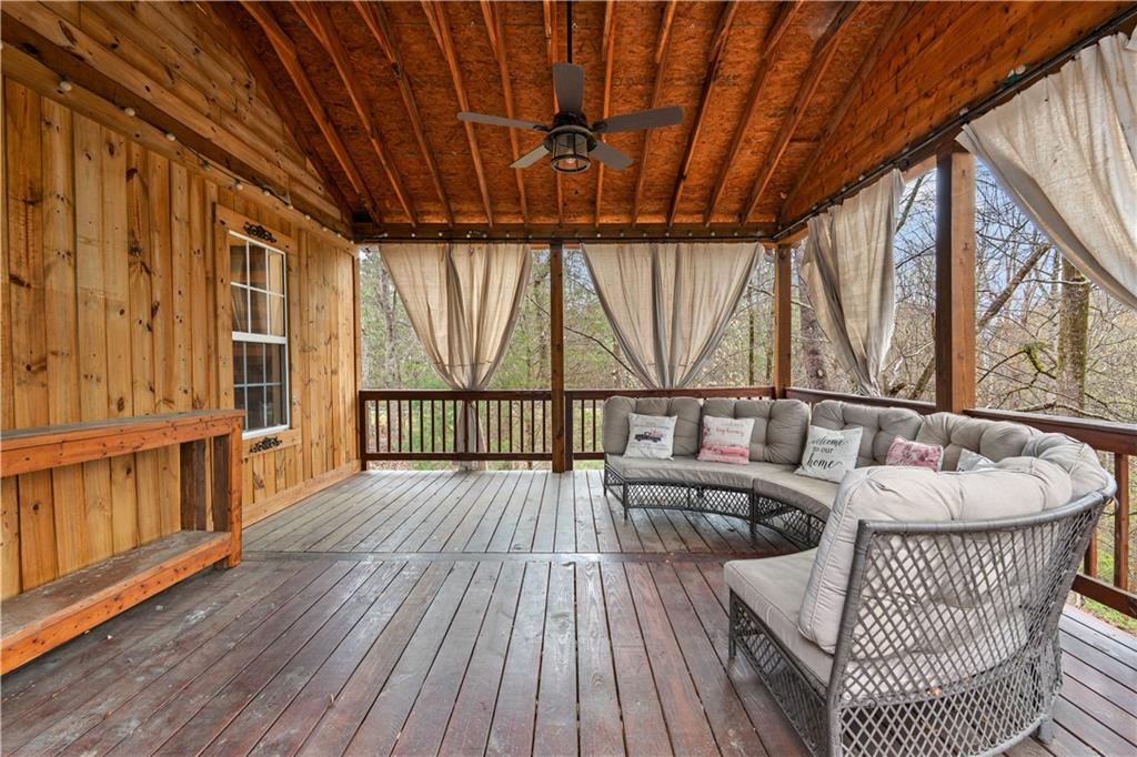 3048 Turner Church Road McDonough, GA 30252 - Photo 50 of 57 a view of balcony with wooden floor and outdoor seating
