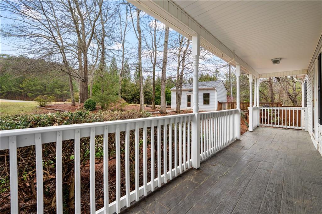 3048 Turner Church Road McDonough, GA 30252 - Photo 5 of 57 a view of a large building with wooden floor and fence