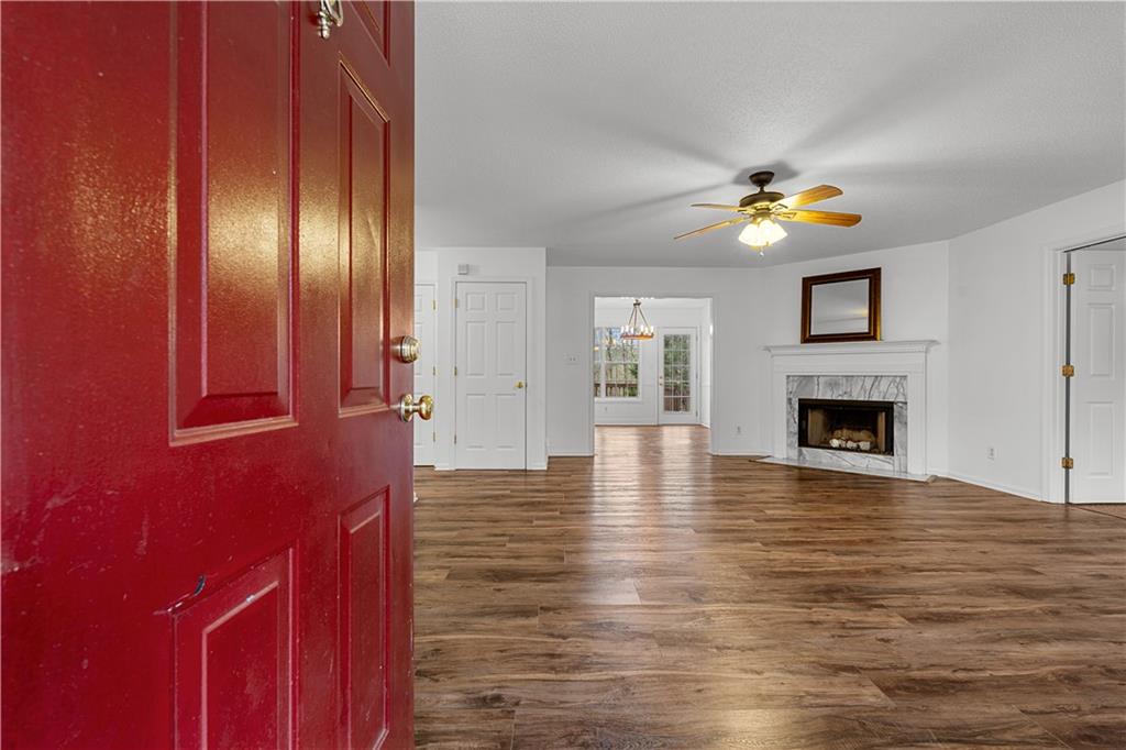 3048 Turner Church Road McDonough, GA 30252 - Photo 6 of 57 a view of an empty room with window and fireplace