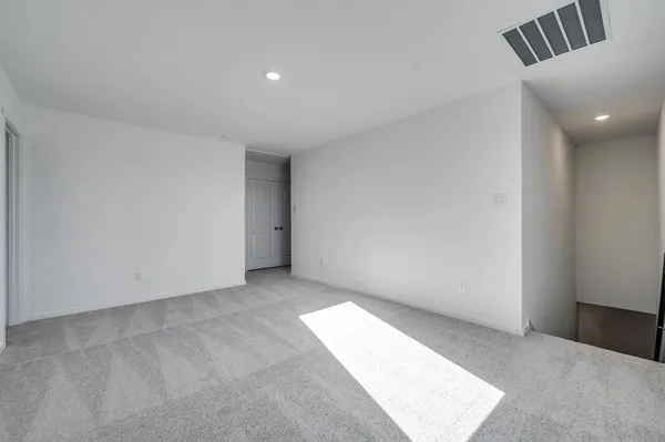 an empty room with a natural light
