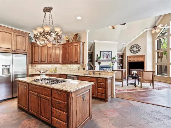 a kitchen with a sink and stove
