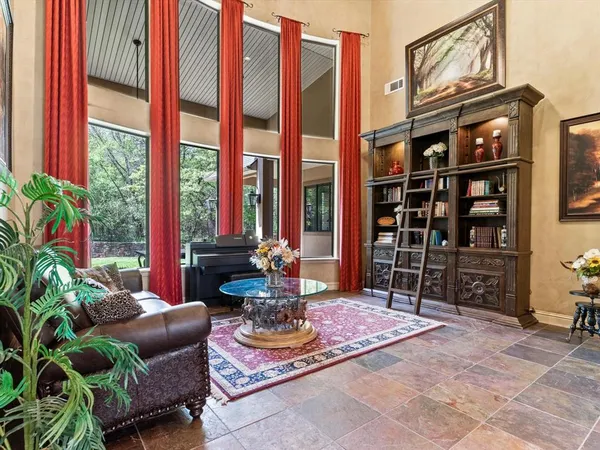 a kitchen with stainless steel appliances granite countertop a stove oven and a refrigerator