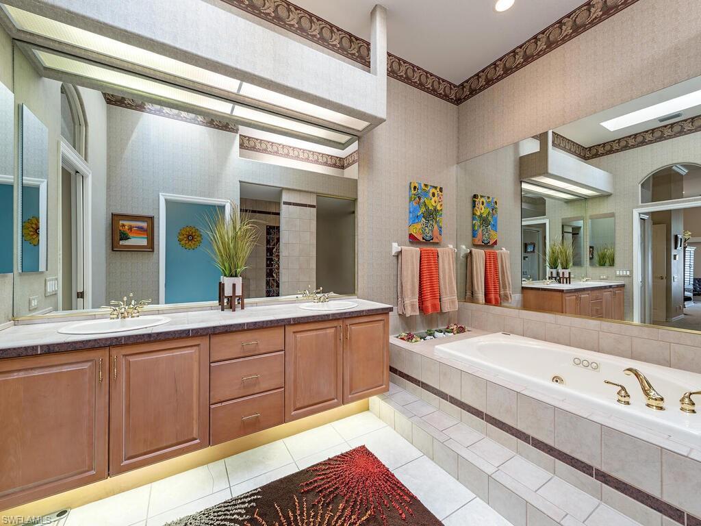5795 Persimmon Way Naples, FL 34110 - Photo 10 of 24 Master Bedroom