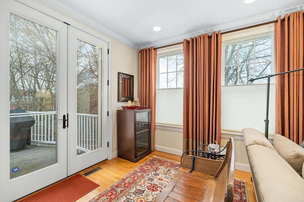 6 Essex Road, Unit 8 Ipswich, MA 01938 - Photo 9 of 35 a view of a bedroom with furniture and windows