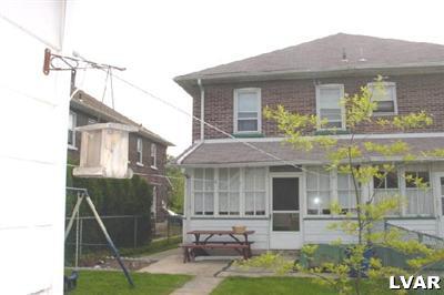 1641 Canal Street Northampton, PA 18067 - Photo 2 of 10 a front view of a house with garden