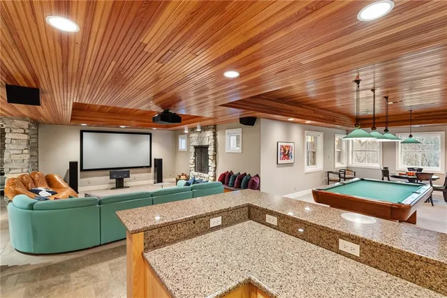 a view of a backyard with furniture and a patio