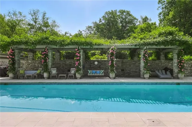 a view of house with outdoor seating space