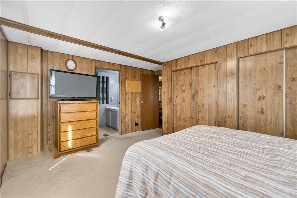 111 A Cowpath Road Aliquippa, PA 15001 - Photo 20 of 46 a bedroom with a bed and a walk in closet