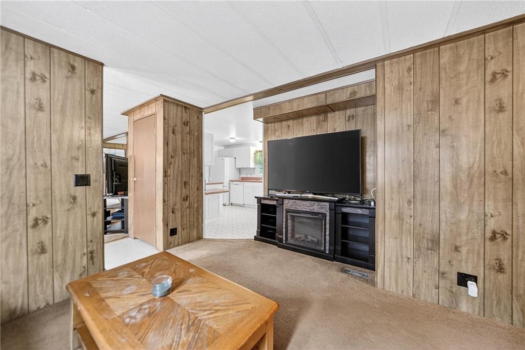 111 A Cowpath Road Aliquippa, PA 15001 - Photo 25 of 46 a living room with furniture and a flat screen tv