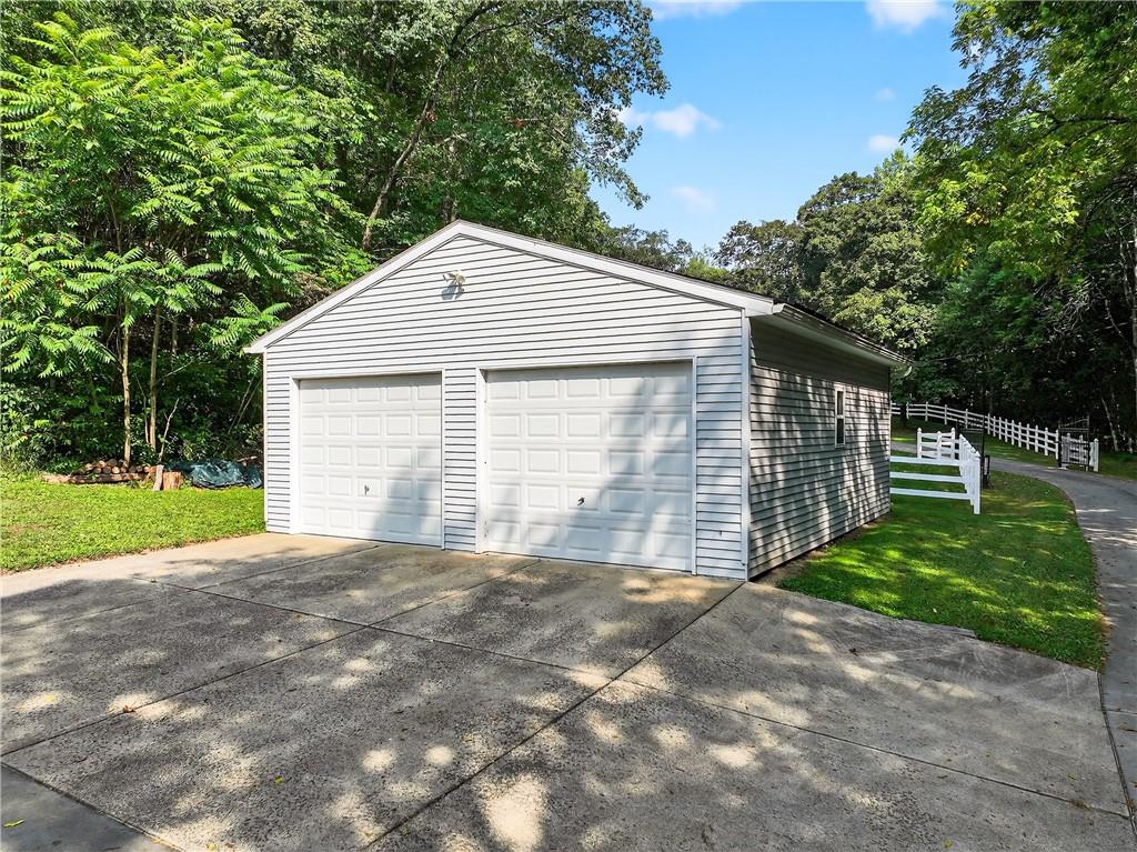 111 A Cowpath Road Aliquippa, PA 15001 - Photo 3 of 46 a front view of a house with a garden