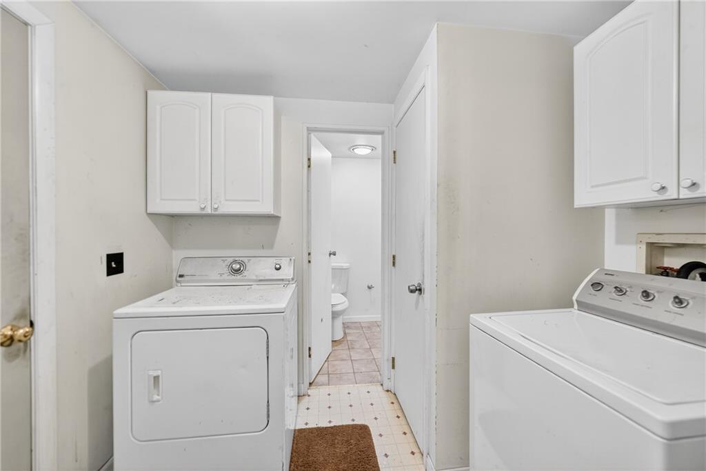 111 A Cowpath Road Aliquippa, PA 15001 - Photo 32 of 46 a utility room with dryer and washer