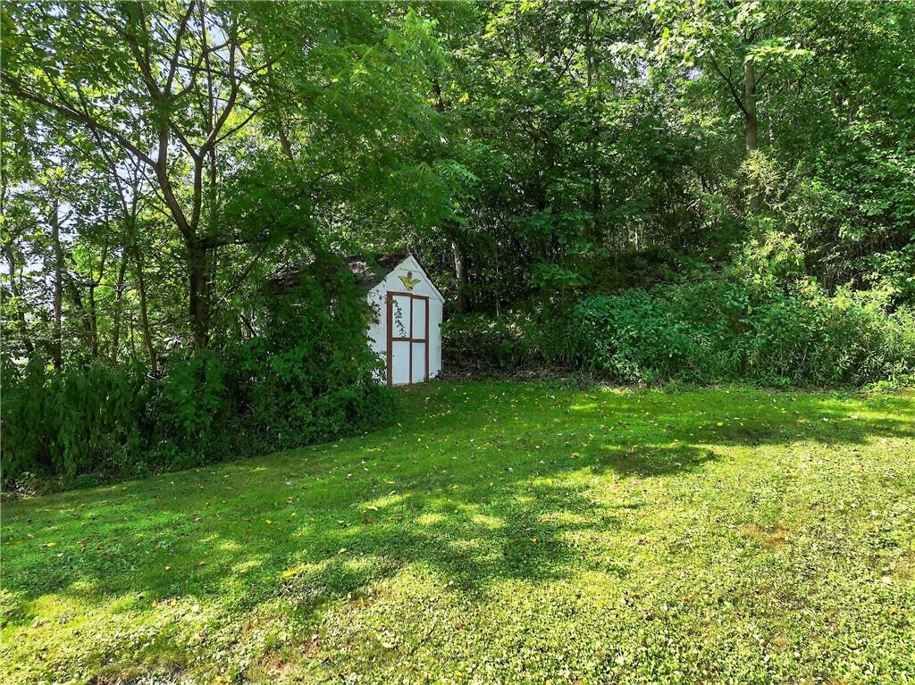 111 A Cowpath Road Aliquippa, PA 15001 - Photo 40 of 46 a front view of a house with garden