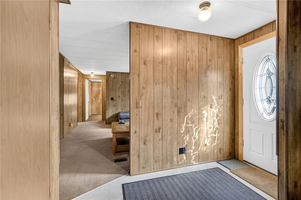 111 A Cowpath Road Aliquippa, PA 15001 - Photo 5 of 46 a view of a hallway with wooden floor and windows