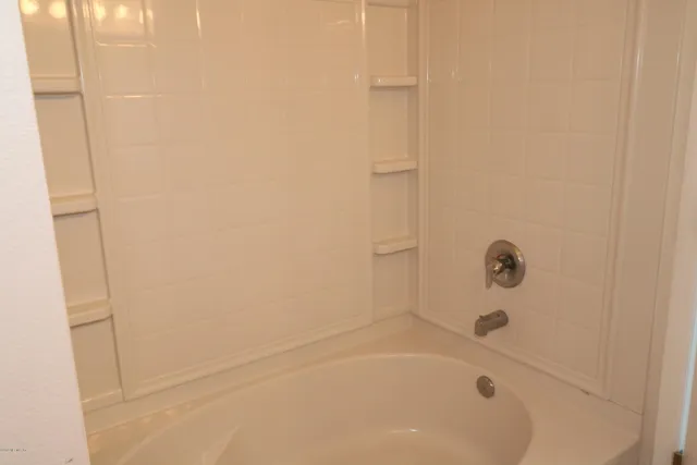 a bathroom with a bathtub