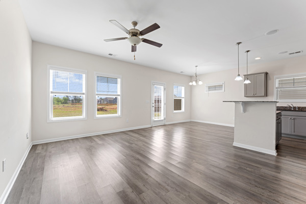 249 Samuel Street Pendleton, SC 29670 - Photo 7 of 33 This bright and airy open-concept space features resilient flooring, perfect for versatile living and entertaining.